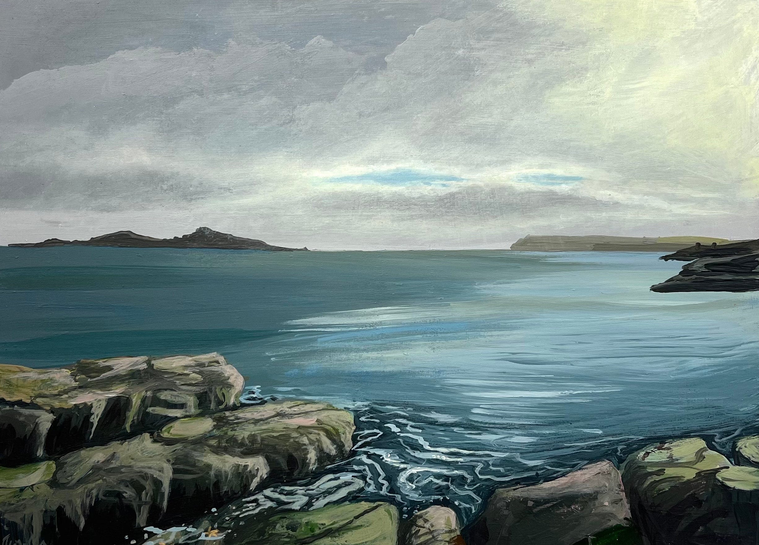 A framed landscape painting of the Skerries islands,  looking towards The Giant's Causeway and Dunluce Castle. 